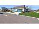 Attractive home with two-car garages, lush landscaping, and pristine lawns at 13676 Mcmillan Dr, Orlando, FL 32827