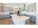 Contemporary kitchen featuring a large island and stainless steel appliances at 13676 Mcmillan Dr, Orlando, FL 32827