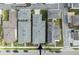 Direct aerial view of residential houses highlighting the rooftop designs and street layout at 13759 Mommsen Ave, Orlando, FL 32827