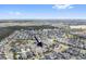 Panoramic aerial view showing the community's layout with homes and neighborhood amenities at 13759 Mommsen Ave, Orlando, FL 32827