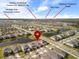 Aerial view of the community and nearby landmarks like Laureate Park Elementary and Orlando VA Medical Center at 13916 Destin Beach Ln, Orlando, FL 32827