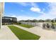Beautiful backyard view of the lake and screened in patio with in ground pool at 13916 Destin Beach Ln, Orlando, FL 32827