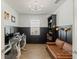 Functional home office with built-in shelving, comfortable seating, and ample workspace for productivity at 13916 Destin Beach Ln, Orlando, FL 32827