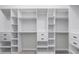 Custom walk-in closet features shelving units and storage space at 14136 Magnolia Glen Cir, Orlando, FL 32828