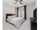 Relaxing bedroom with plush carpet, neutral color palette, and modern furnishings at 14554 Winter Stay Dr, Winter Garden, FL 34787