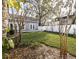 A fenced backyard offering plenty of grass and an inviting deck at 1513 Pinecrest Pl, Orlando, FL 32803