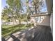 A spacious backyard deck with a landscaped yard and privacy fence at 1513 Pinecrest Pl, Orlando, FL 32803