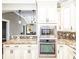Kitchen with stainless steel appliances and granite countertops at 1513 Pinecrest Pl, Orlando, FL 32803