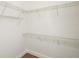 A walk-in closet with adjustable wire shelving, providing ample storage space at 1513 Pinecrest Pl, Orlando, FL 32803