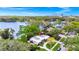 Stunning aerial view of the home showcasing lush greenery and waterfront access at 1532 Lake Shore Dr, Orlando, FL 32803