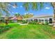 Spacious backyard with patio, lush lawn, and mature trees for ultimate privacy at 1532 Lake Shore Dr, Orlando, FL 32803