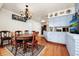 Dining area showcasing hardwood floors and a chandelier at 1532 Lake Shore Dr, Orlando, FL 32803