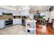 Dining area with granite countertops, stainless steel appliances, and a chandelier at 1532 Lake Shore Dr, Orlando, FL 32803