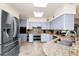Kitchen featuring stainless steel appliances, granite counters, and ample cabinet space at 1532 Lake Shore Dr, Orlando, FL 32803