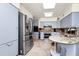Kitchen featuring stainless steel appliances, granite counters, and ample cabinet space at 1532 Lake Shore Dr, Orlando, FL 32803