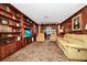 Spacious living room with built-in shelving and comfortable seating area at 1532 Lake Shore Dr, Orlando, FL 32803