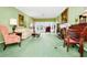 Spacious living room with a fireplace, traditional furnishings, and natural light at 1532 Lake Shore Dr, Orlando, FL 32803