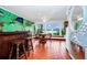 Unique space featuring a custom mural, tiled floors, and a bar area perfect for entertaining guests at 1532 Lake Shore Dr, Orlando, FL 32803