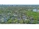 Beautiful aerial view of lush green neighborhood with mature trees and well-maintained homes at 1600 Barcelona Way, Winter Park, FL 32789