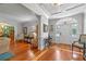 Bright foyer with hardwood floors, decorative molding, and ample natural light creating a welcoming entrance at 1600 Barcelona Way, Winter Park, FL 32789