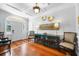 Bright foyer with hardwood floors, decorative molding, and ample natural light creating a welcoming entrance at 1600 Barcelona Way, Winter Park, FL 32789