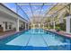 Spacious pool area with screened enclosure and tiled pool, great for entertaining at 1600 Barcelona Way, Winter Park, FL 32789