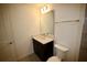 Bathroom with a vanity and integrated sink, tile floors, and a glass-enclosed shower at 1995 Iorio St, St Cloud, FL 34771
