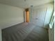Cozy bedroom with carpet, closet, and window for lots of natural light at 1995 Iorio St, St Cloud, FL 34771