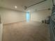 Spacious garage with sealed concrete floor, ready for parking and storage at 1995 Iorio St, St Cloud, FL 34771