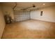 Spacious two-car garage with automatic door, ample room for parking and storage at 1995 Iorio St, St Cloud, FL 34771