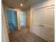 Hallway with carpet flooring and white doors at 1995 Iorio St, St Cloud, FL 34771