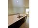 Close-up of the kitchen island featuring stainless steel sink and modern appliances at 1995 Iorio St, St Cloud, FL 34771