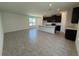 Open kitchen and living room area filled with tons of natural light at 1995 Iorio St, St Cloud, FL 34771
