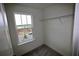 Walk-in closet with a large window providing lots of natural light at 1995 Iorio St, St Cloud, FL 34771