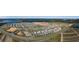 Panoramic aerial view showcasing the Primary-planned community layout, residential homes, and surrounding lakes and landscapes at 2000 Heart Lake Dr, Groveland, FL 34736
