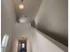 Bright hallway featuring stairway and light entering from a window at 2000 Heart Lake Dr, Groveland, FL 34736