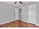Bedroom with a ceiling fan and a double closet at 2102 Nedra Ave, Deltona, FL 32725
