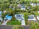 Aerial view of the property highlighting the home, yard, and surrounding neighborhood at 211 E Muriel St, Orlando, FL 32806
