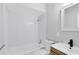Bathroom featuring white subway tiles in the shower and a modern vanity with a black faucet at 211 E Muriel St, Orlando, FL 32806