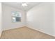 Carpeted bedroom with natural light at 2523 Water Valley Dr, St Cloud, FL 34771