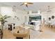 Open-concept living space connecting the kitchen, dining, and living areas, perfect for entertaining at 2523 Water Valley Dr, St Cloud, FL 34771