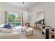 Inviting living room with sliding glass doors providing plenty of natural light and backyard views at 2523 Water Valley Dr, St Cloud, FL 34771