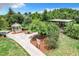 A community pavilion near a walking path and manicured landscaping at 2523 Water Valley Dr, St Cloud, FL 34771
