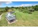 Community picnic table with shade and lush landscaping at 2523 Water Valley Dr, St Cloud, FL 34771