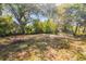A spacious, grassy backyard ready for landscaping and outdoor enjoyment at 2605 S Elm Ave, Sanford, FL 32773