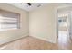 Bedroom with tile flooring, window, and ceiling fan at 2605 S Elm Ave, Sanford, FL 32773