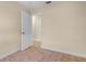 Neutral bedroom featuring tile floors and access to another room at 2605 S Elm Ave, Sanford, FL 32773