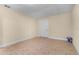 A clean, empty bedroom features tile floors and fresh neutral paint at 2605 S Elm Ave, Sanford, FL 32773