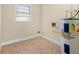 Utility room with a window and water heater at 2605 S Elm Ave, Sanford, FL 32773