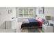 Well-lit bedroom with a large window, soft carpet, and views of the backyard at 2679 Metro Sevilla Dr # 101, Orlando, FL 32835